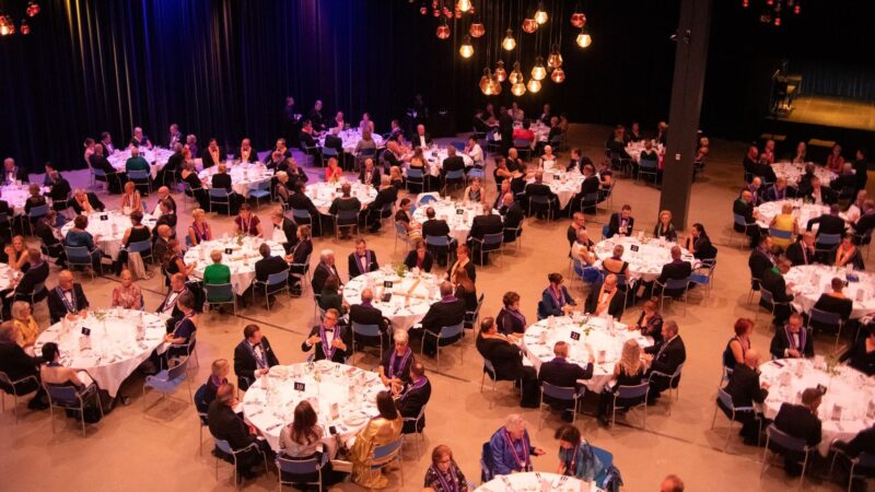 Gala Dinner setting with round tables at Park Hall in Tampere Hall